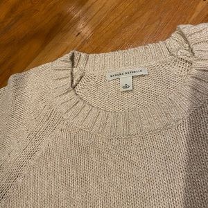 Beautiful cream sweater with gold accent throughout!